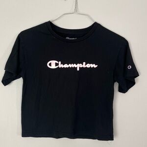 Champion Girls Short Sleeved T Shirt. Large. With Pink and white lettering.